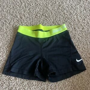 nike spandex. size small. black and yellow